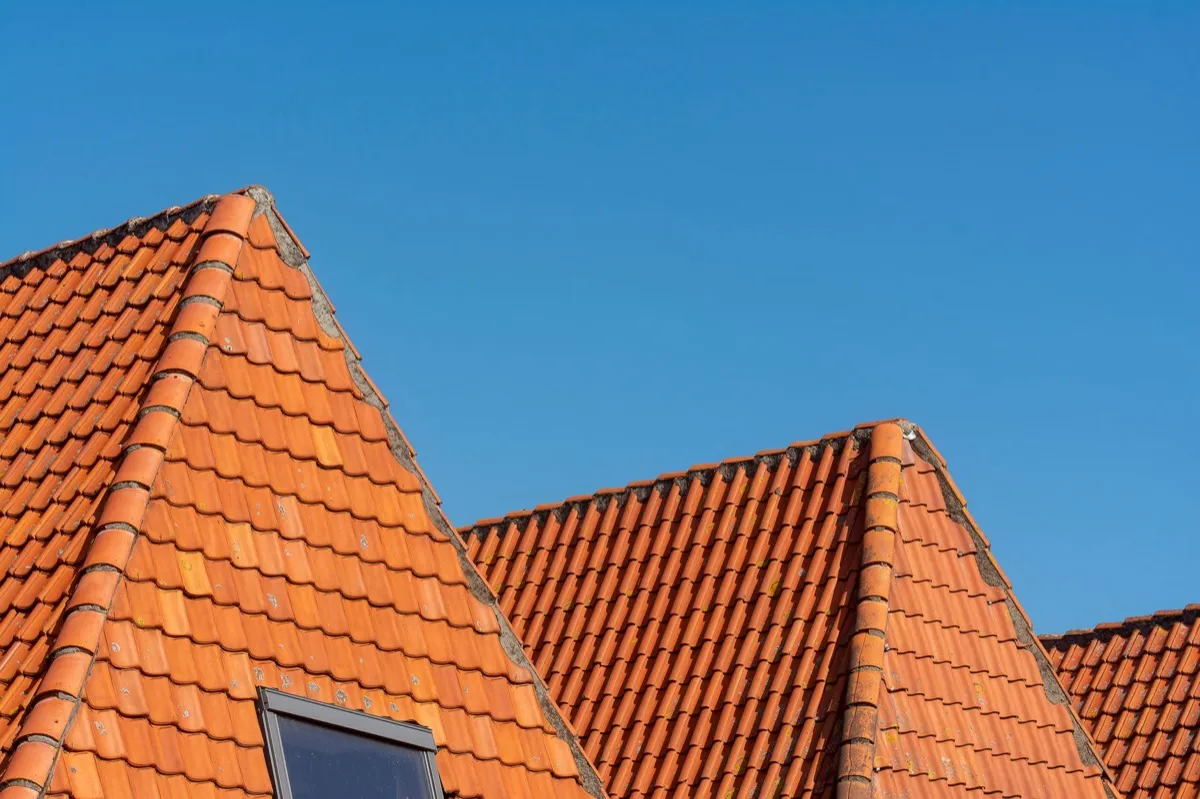Clay barrel tile rooflines on homes in Champaign, IL