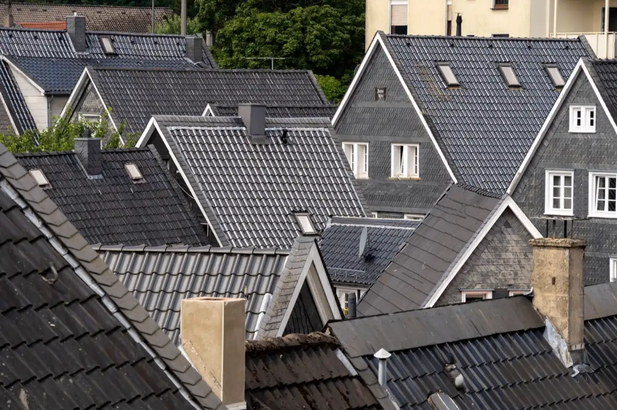 Steep roof eaves and gutter lines on houses in Champaign, IL